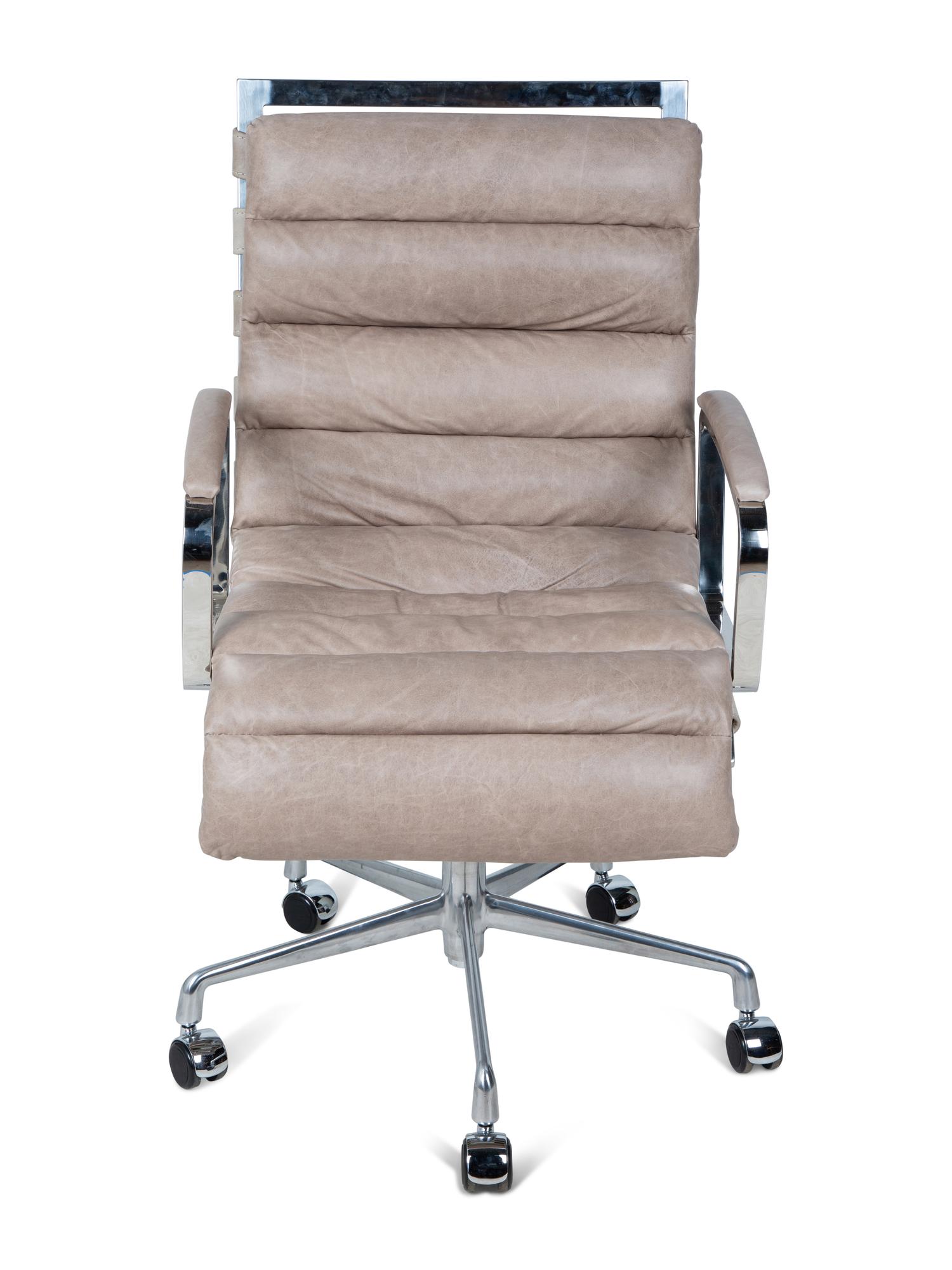 A Contemporary Chrome and Leather Swivel Desk Chair — 20TH CENTURY