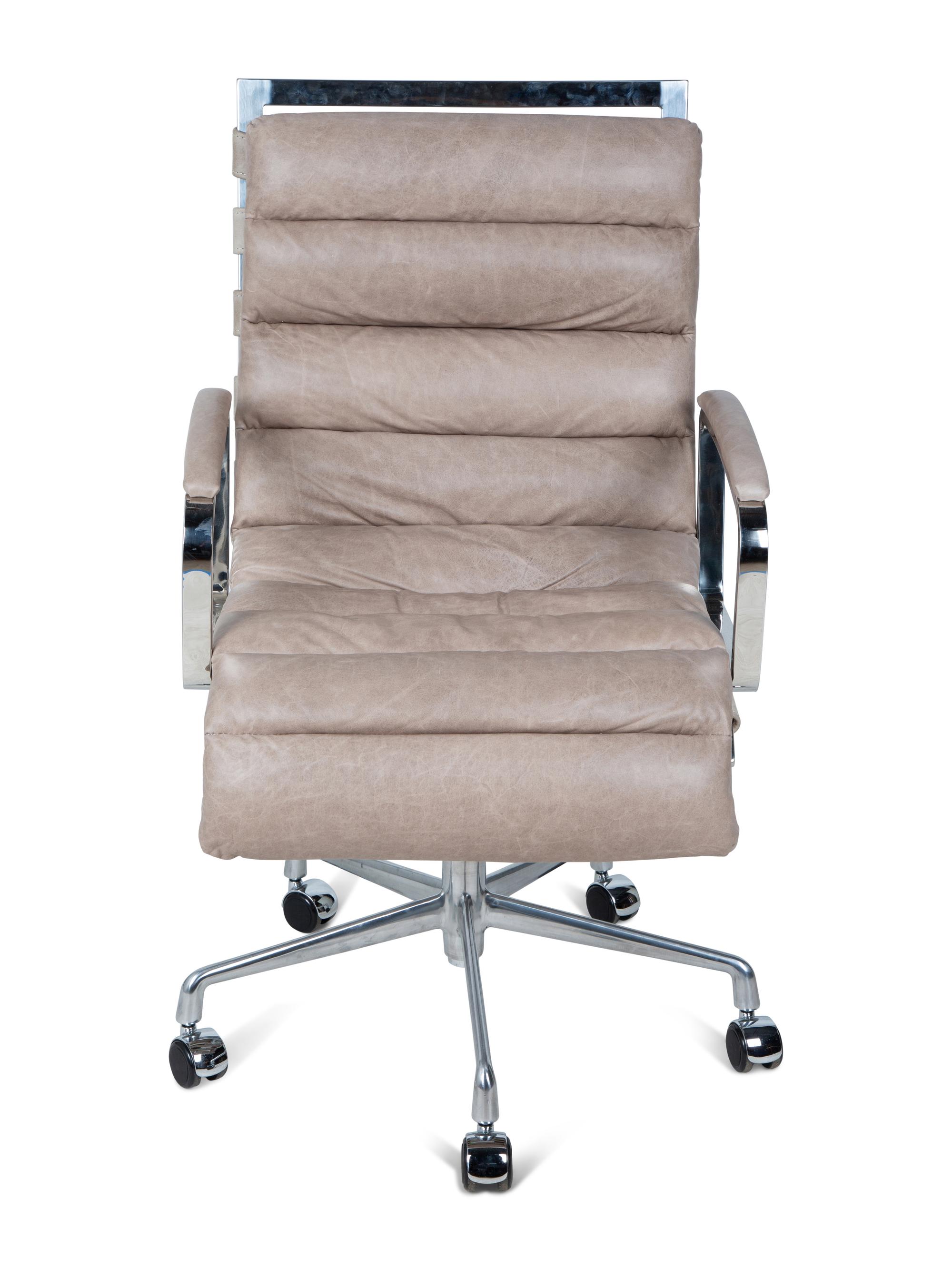 A Contemporary Chrome and Leather Swivel Desk Chair — 20TH CENTURY