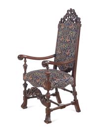 An Italian Baroque Style Carved Walnut Armchair