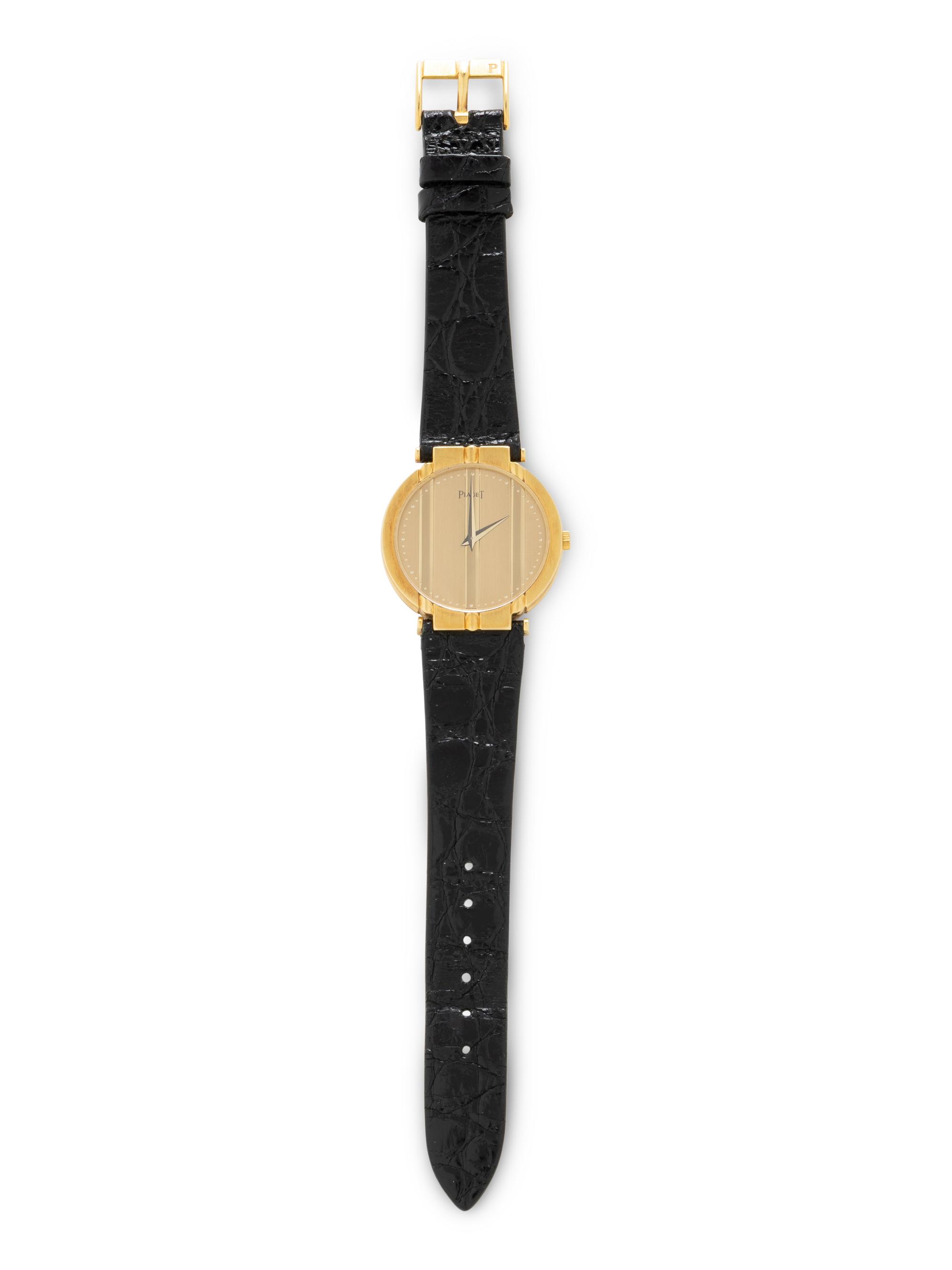 PIAGET, REF. 8673 18K YELLOW GOLD 'POLO' WATCH, WITH PIAGET GOLD BUCKLE
