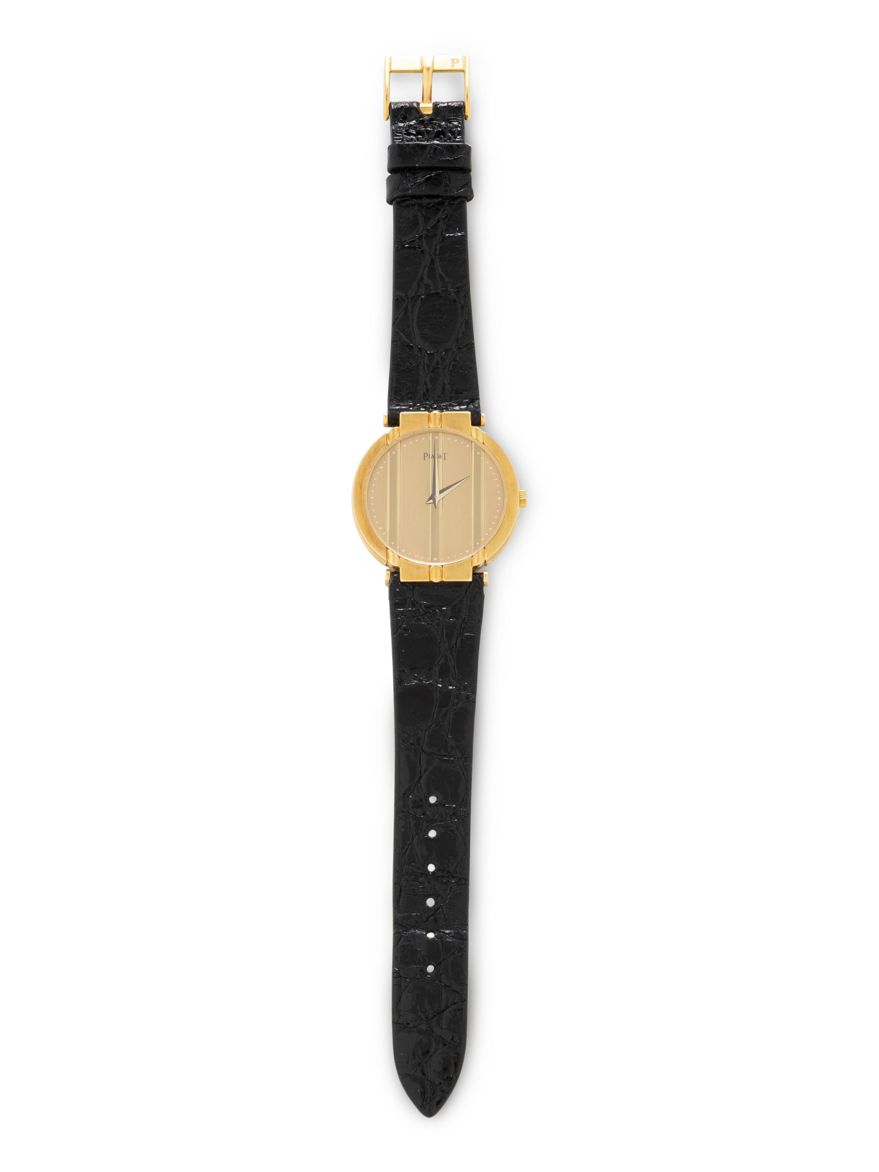 PIAGET, REF. 8673 18K YELLOW GOLD 'POLO' WATCH, WITH PIAGET GOLD BUCKLE