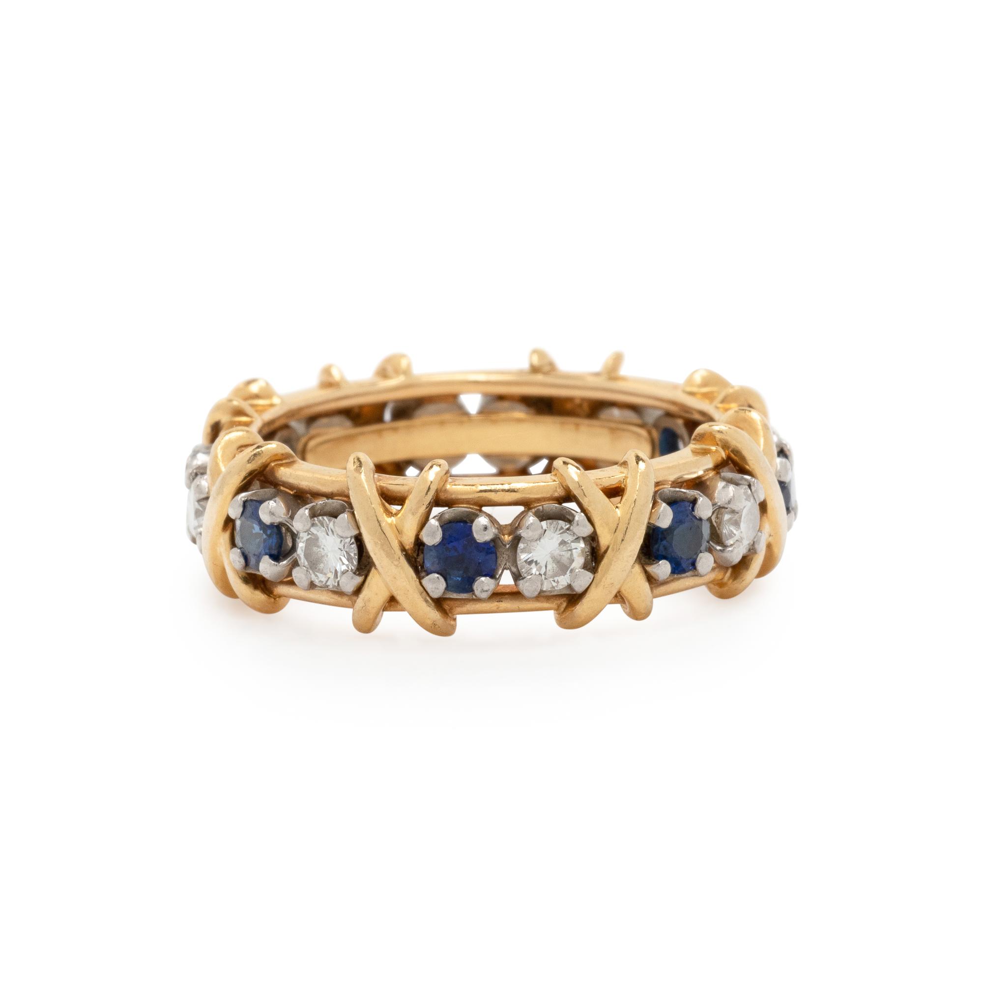 TIFFANY & CO., SCHLUMBERGER, DIAMOND AND SAPPHIRE 'SIXTEEN STONE' RING