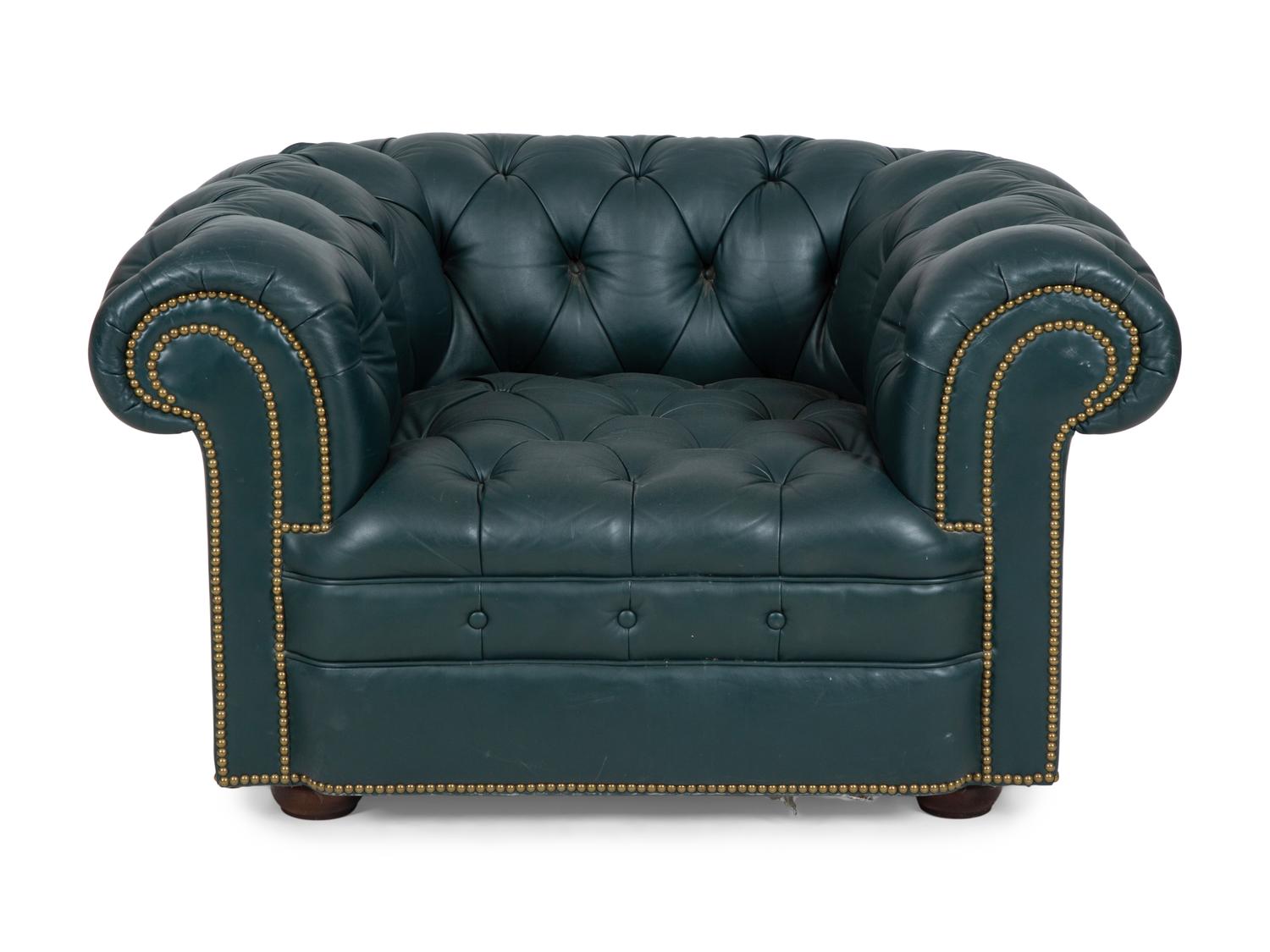 A Chesterfield Style Button-Tufted Leather Armchair