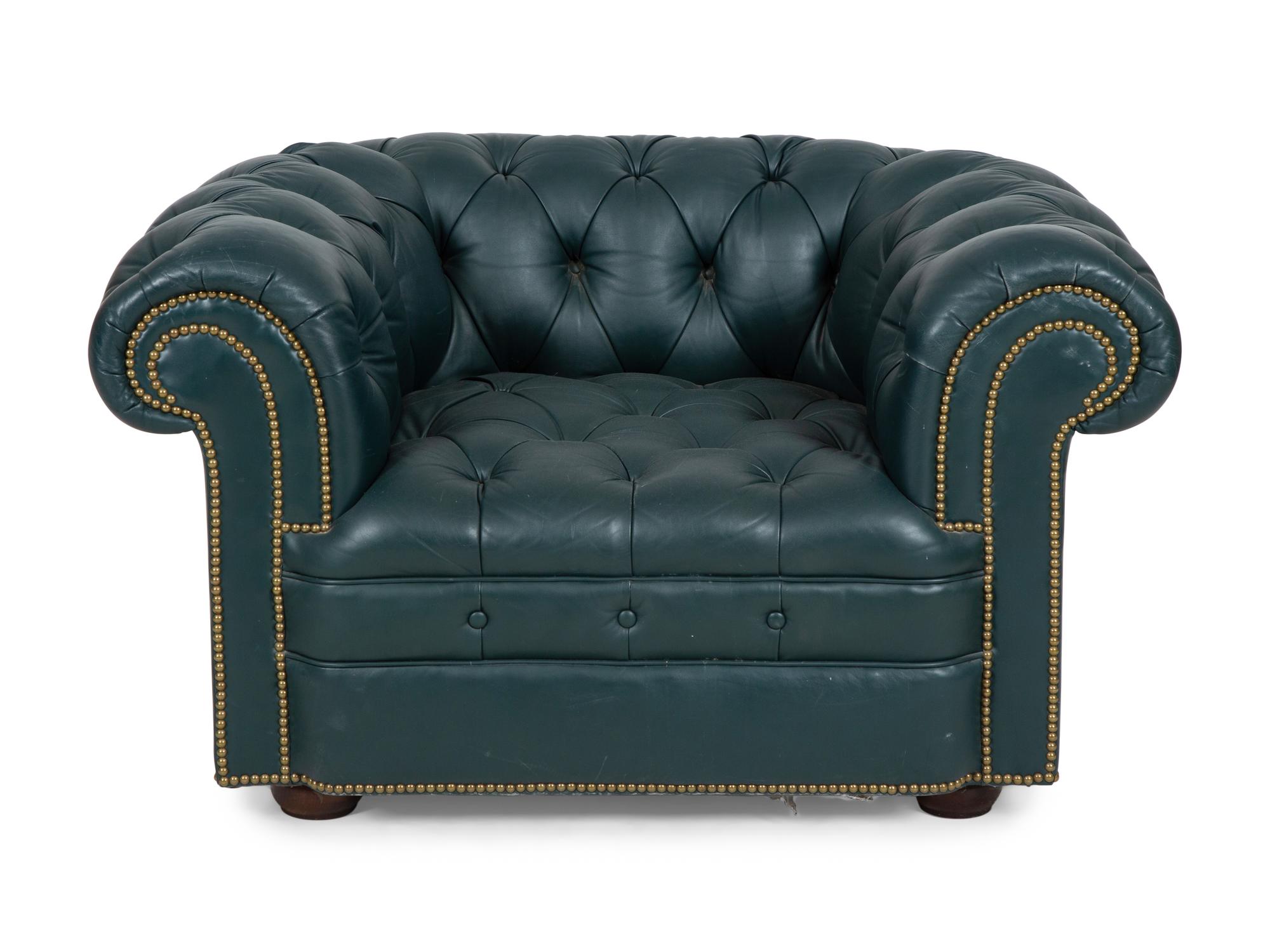 A Chesterfield Style Button-Tufted Leather Armchair