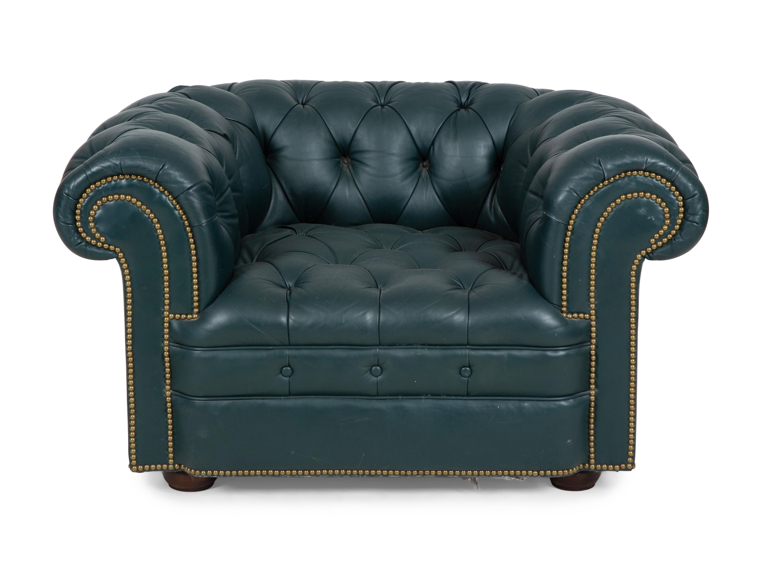 A Chesterfield Style Button-Tufted Leather Armchair