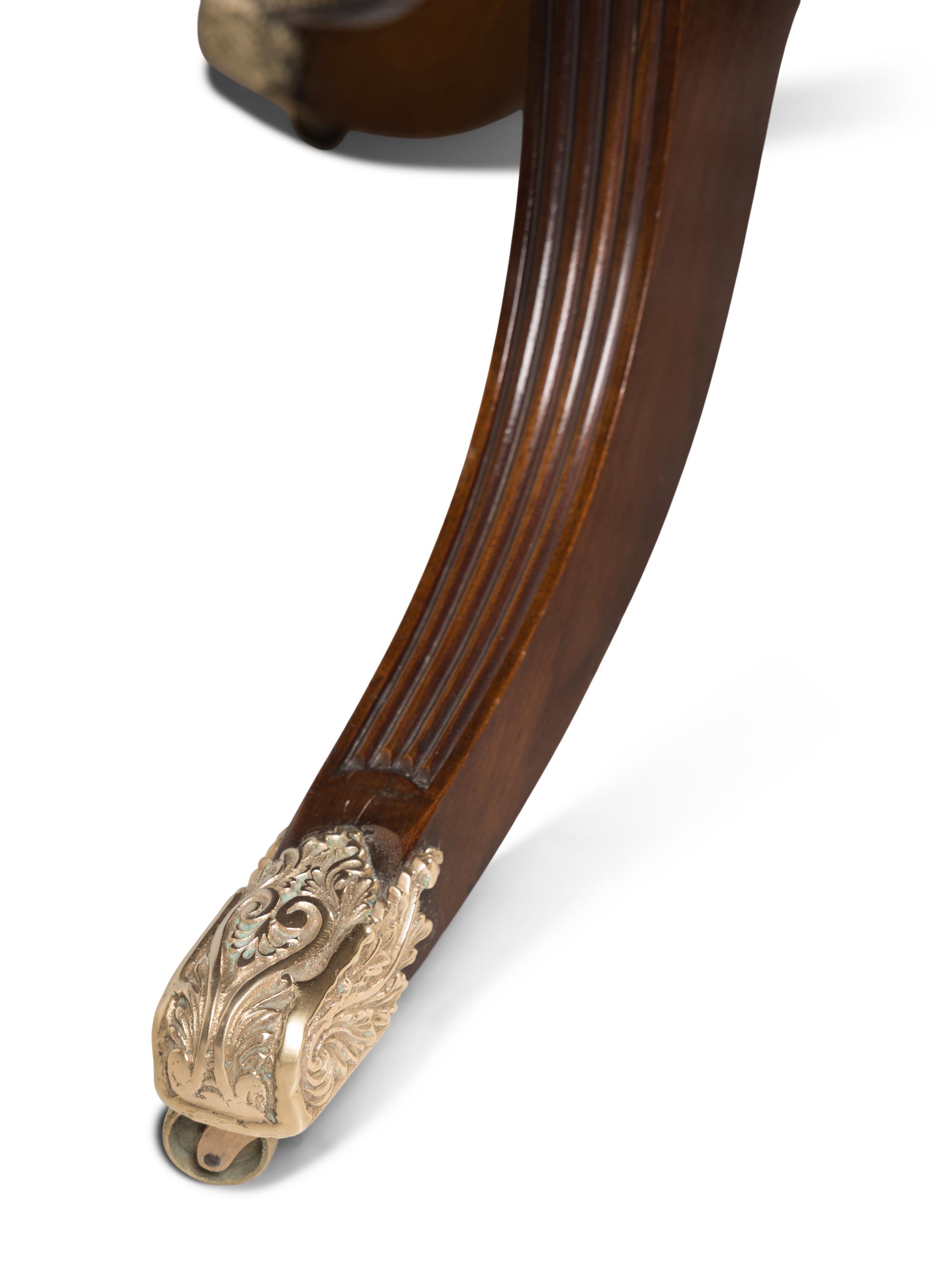 A George III Style Mahogany Triple-Pedestal Dining Table
