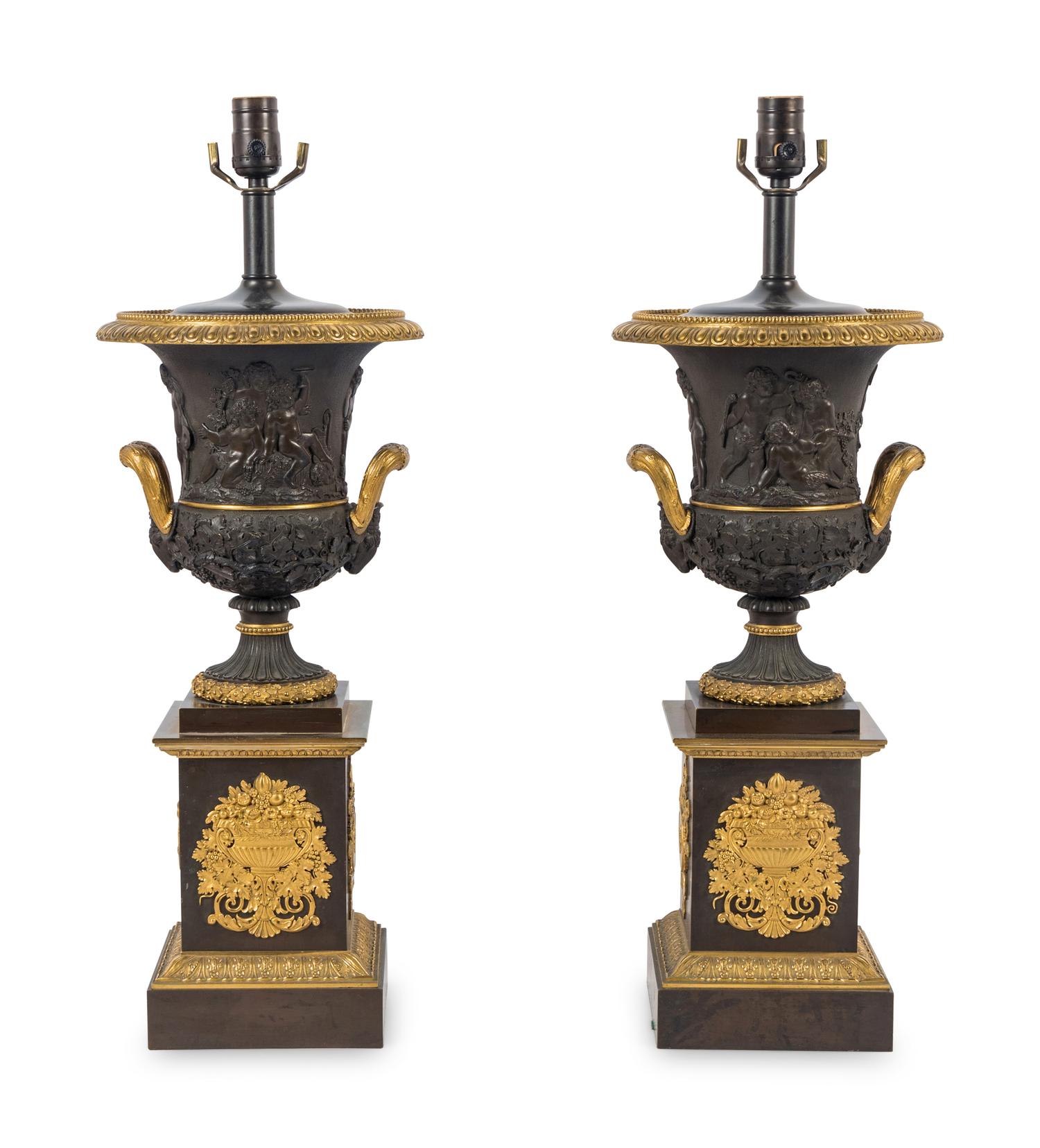 A Pair of Louis Phillippe Parcel-Gilt and Patinated Bronze Urns Mounted as Lamps