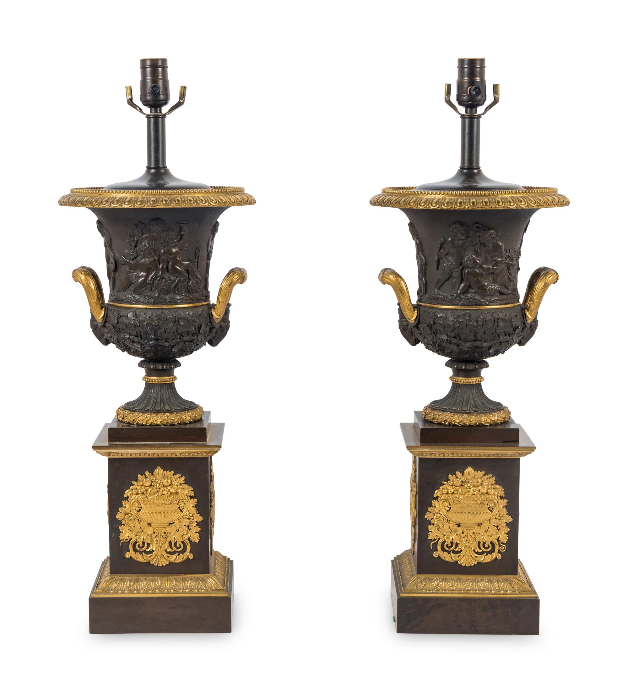 A Pair of Louis Phillippe Parcel-Gilt and Patinated Bronze Urns Mounted as Lamps