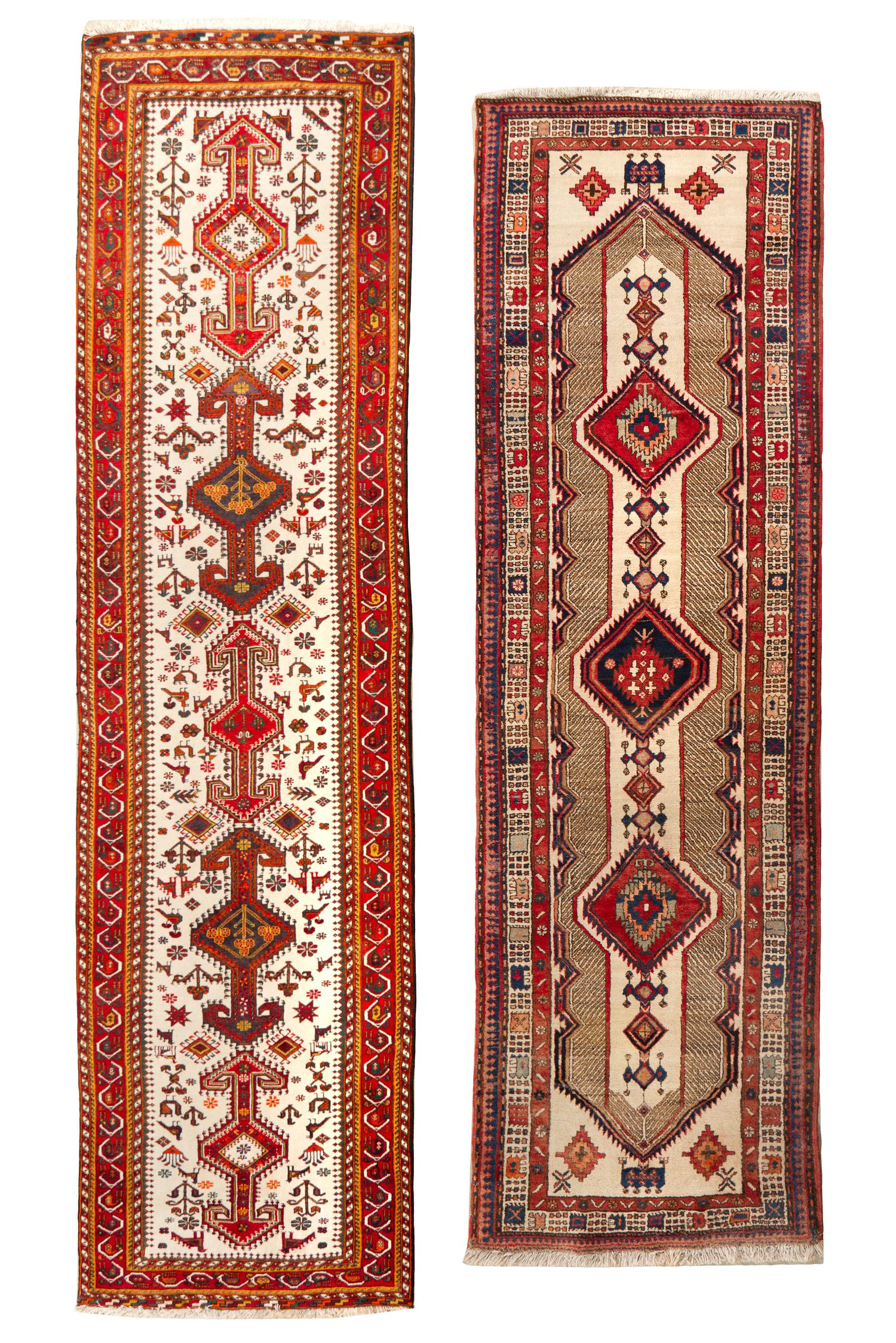 Two Heriz Wool Runners. Length of longer 14 feet 7 inches x 3 feet 6 inches.