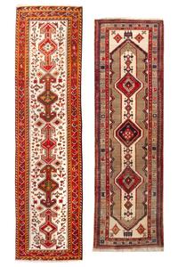 Two Heriz Wool Runners. Length of longer 14 feet 7 inches x 3 feet 6 inches.