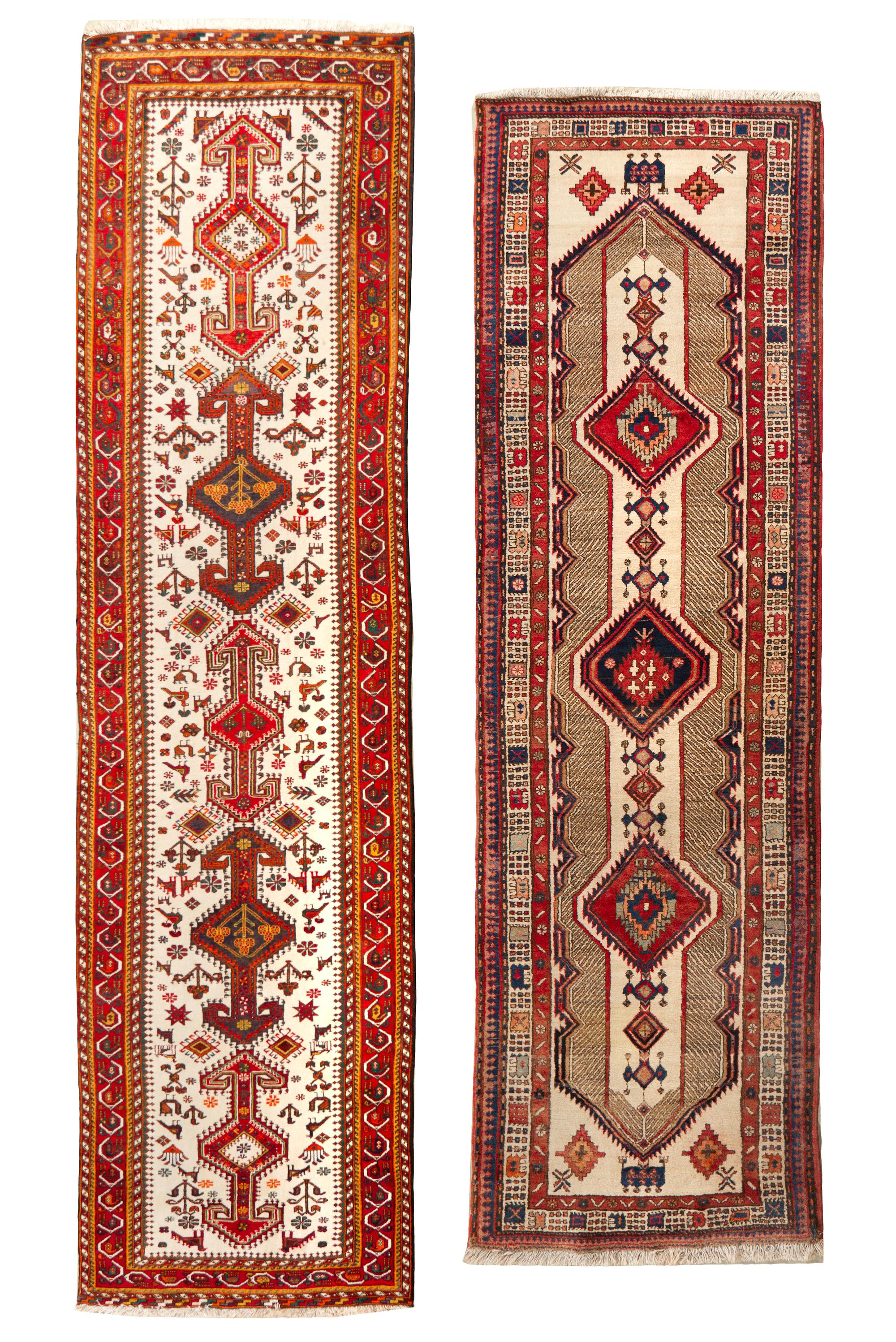 Two Heriz Wool Runners. Length of longer 14 feet 7 inches x 3 feet 6 inches.