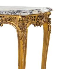 A Louis XV Style Carved Giltwood Marble-Top Table