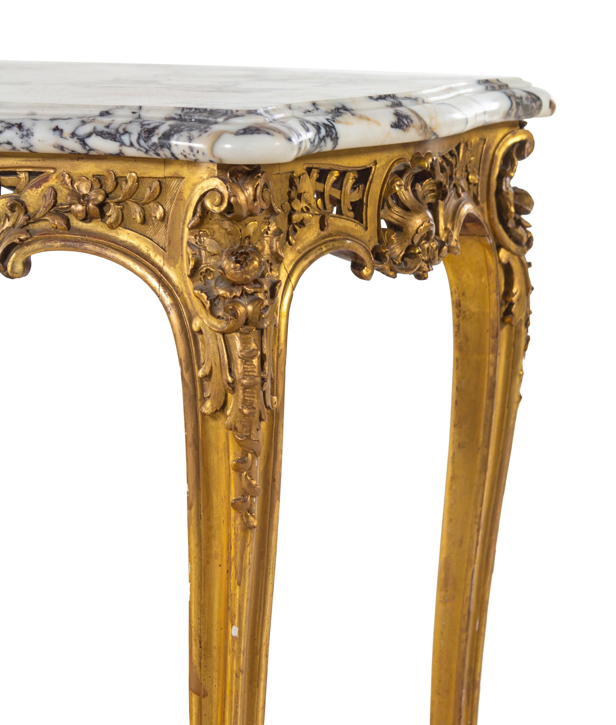 A Louis XV Style Carved Giltwood Marble-Top Table