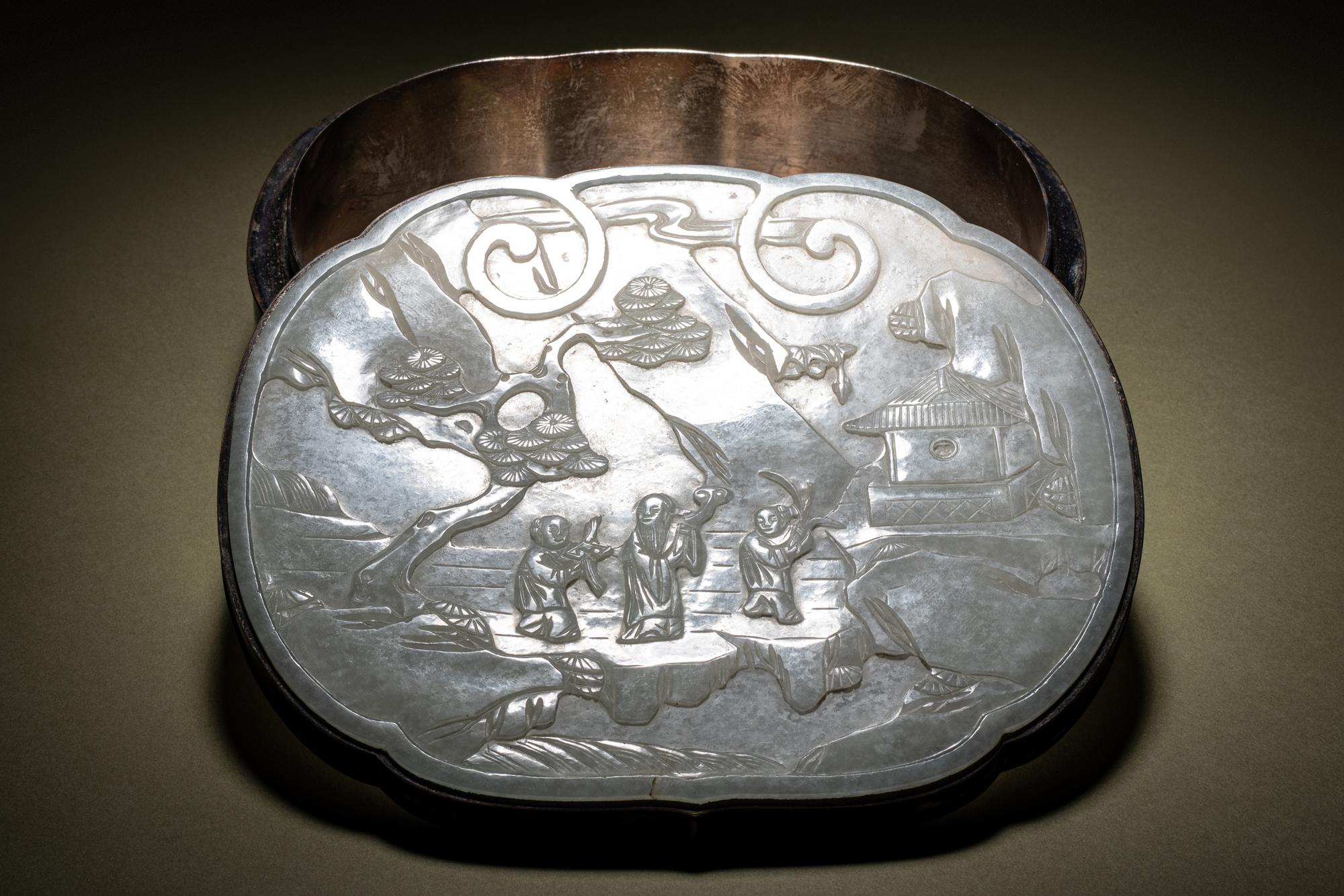 A White Jade Mounted Lacquered Silvered Metal Box and Cover