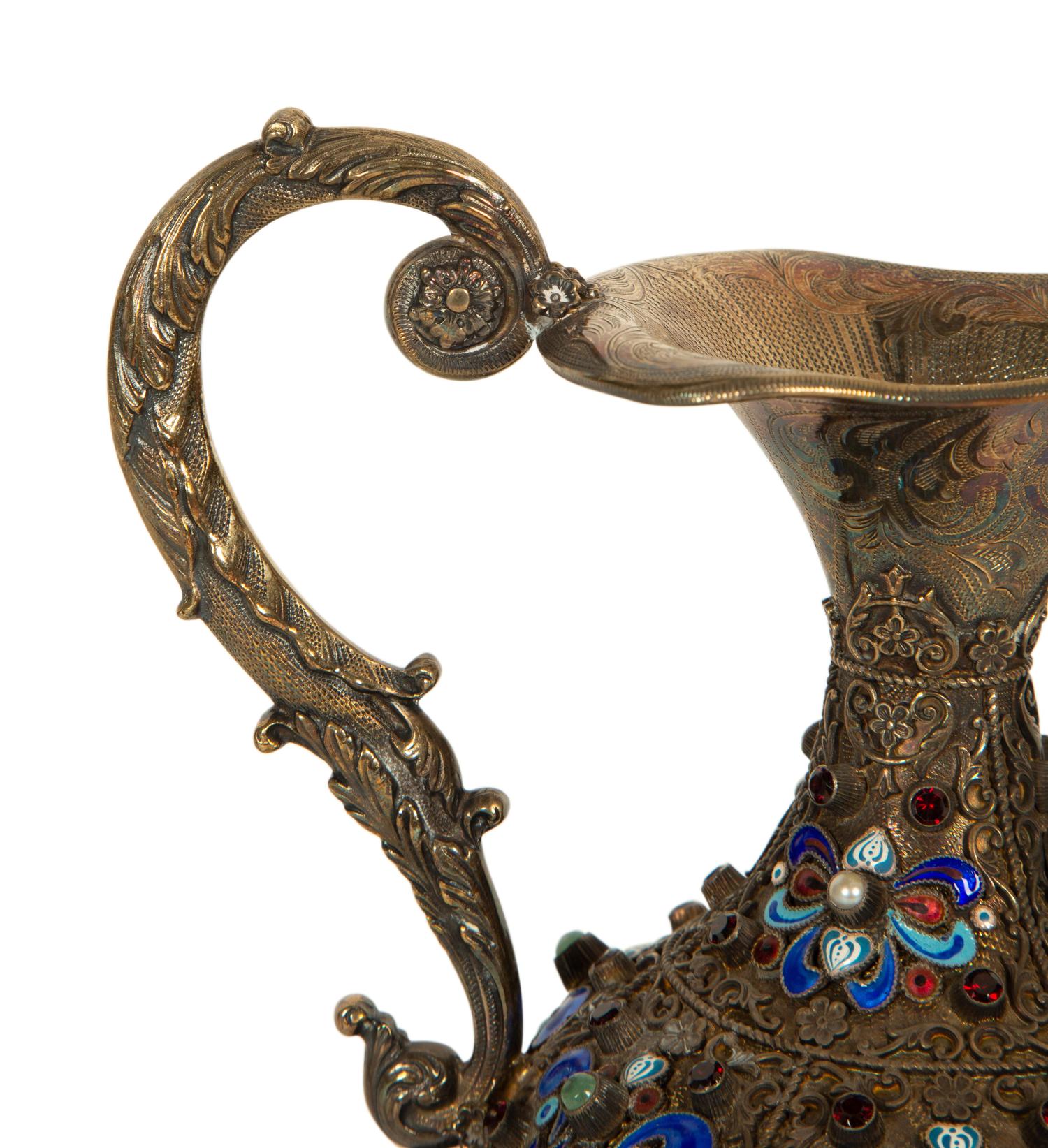 A Continental Enameled and Gem-Encrusted Silver-Gilt Wine Ewer