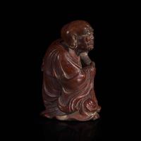 A Chinese finely-carved bamboo luohan and lion 竹雕笑狮罗汉 Qing dynasty ?