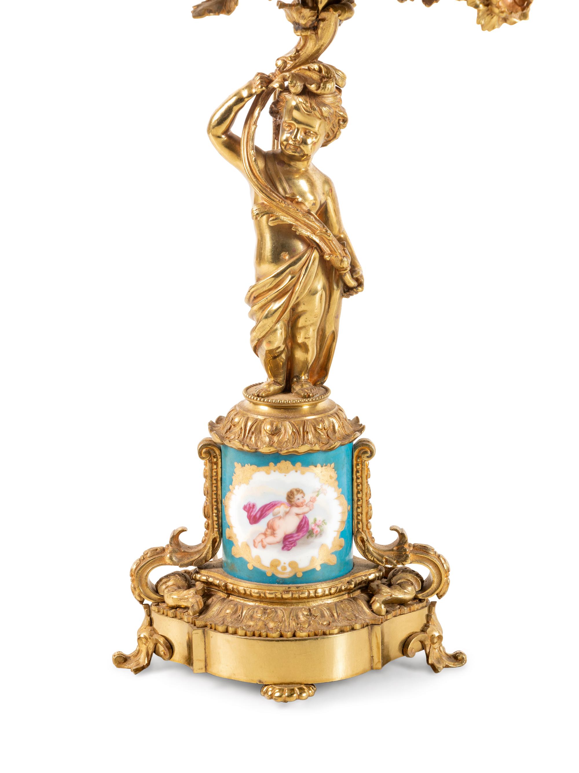 A Pair of Sèvres Style Porcelain Mounted Gilt Bronze Six-Light Candelabra