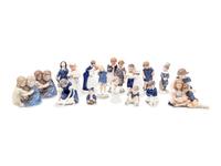 Fourteen Royal Copenhagen Porcelain Figures
