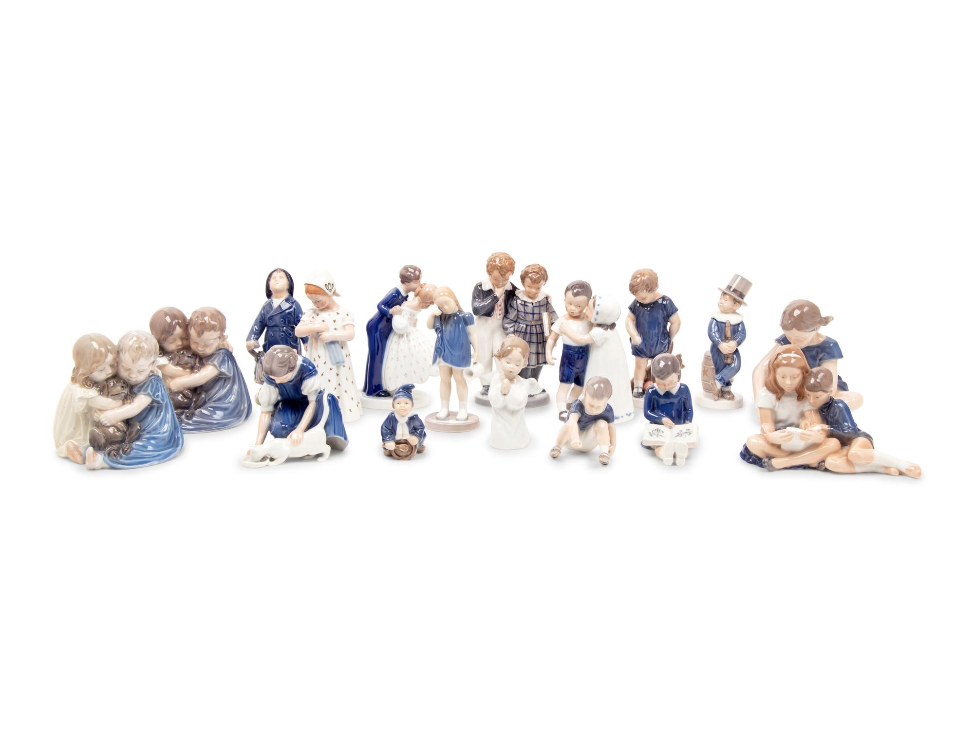 Fourteen Royal Copenhagen Porcelain Figures