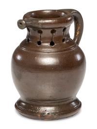 A Rare William Rowley Slip-Glazed Puzzle Jug
