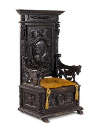 A Jacobean Carved Oak Hall Chair