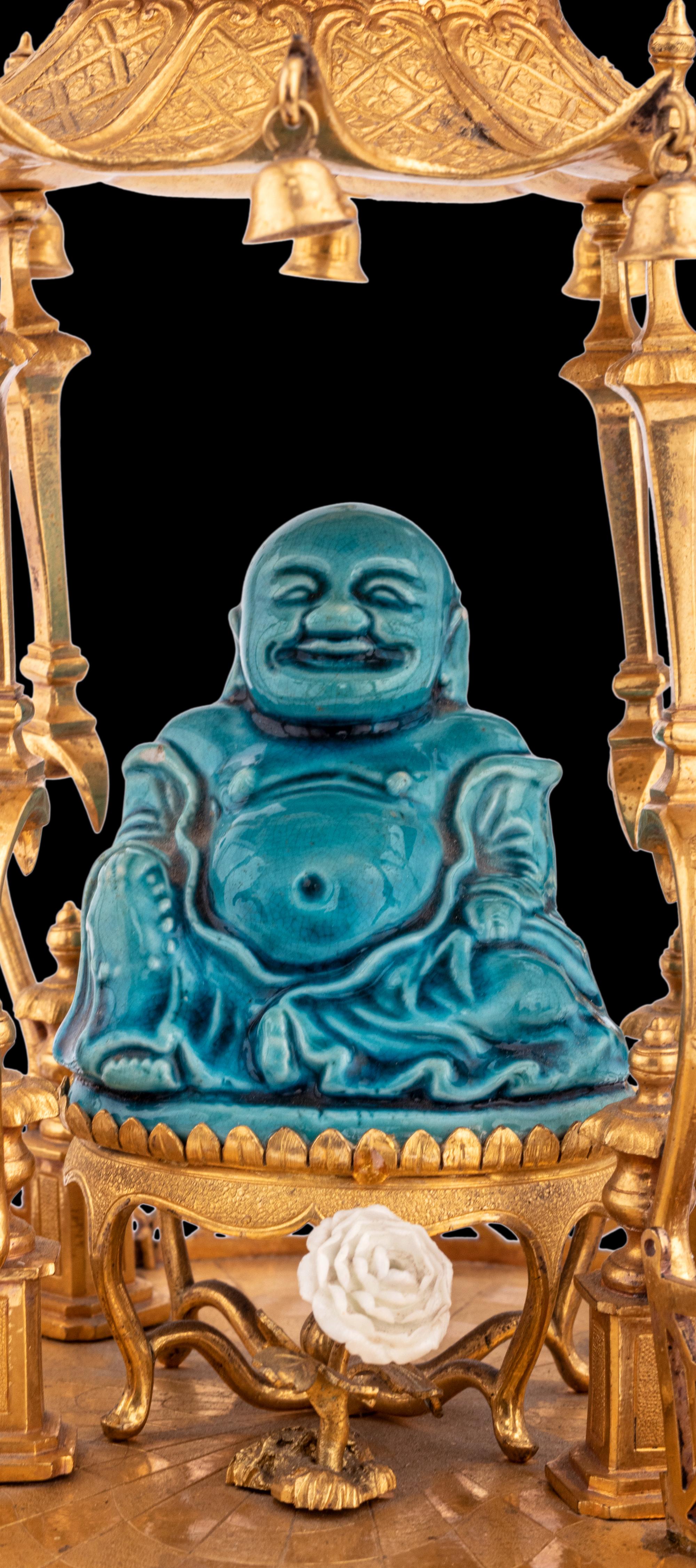 A Louis XV Style Gilt Bronze and Chinese Porcelain Mounted Pagoda-Form Mantel Clock