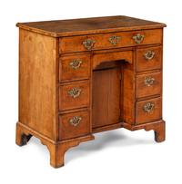 A George II Walnut Kneehole Desk