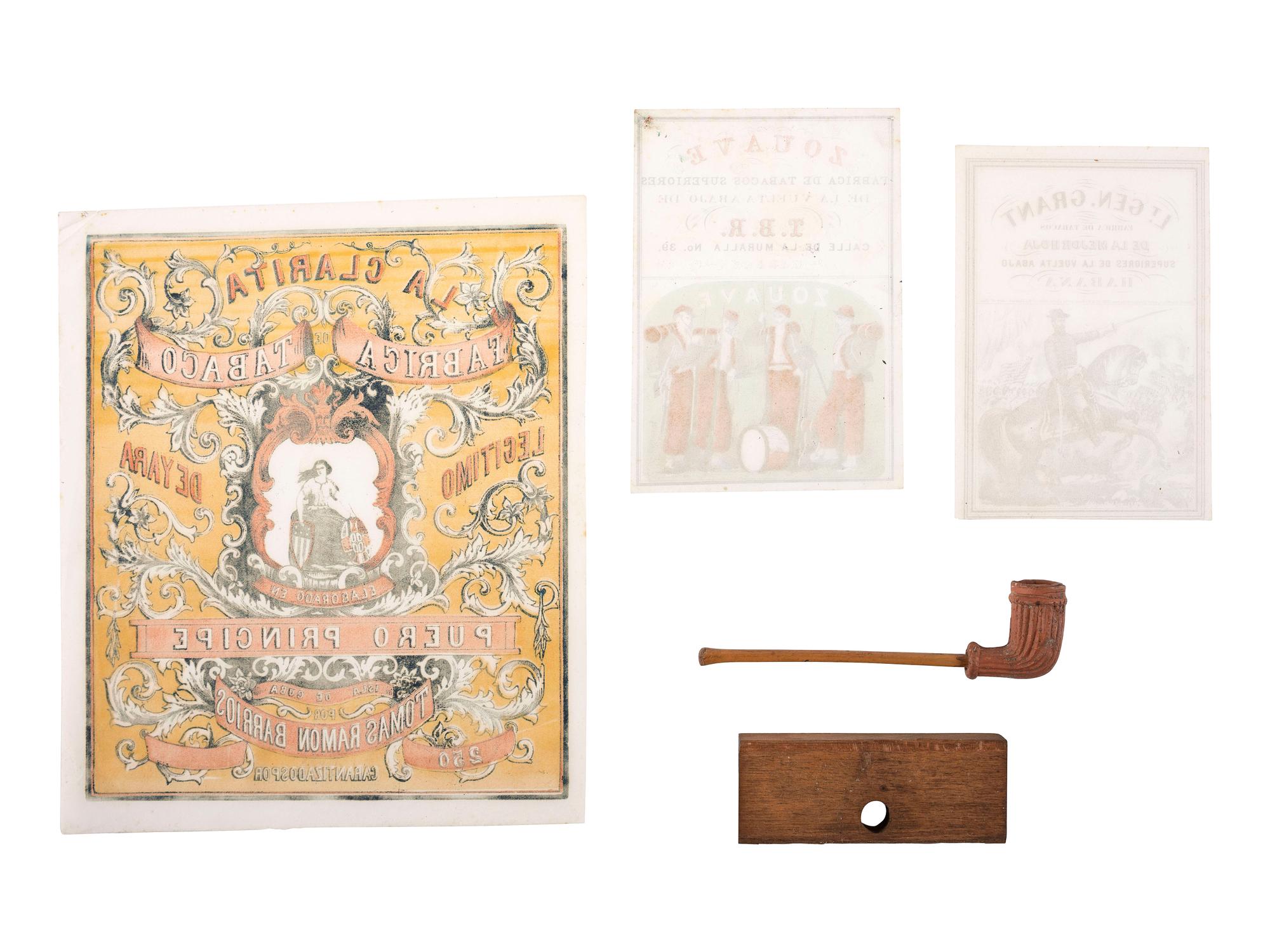 [CIVIL WAR]. A group of illustrated cigar labels, carved pipe, and cigar roller.