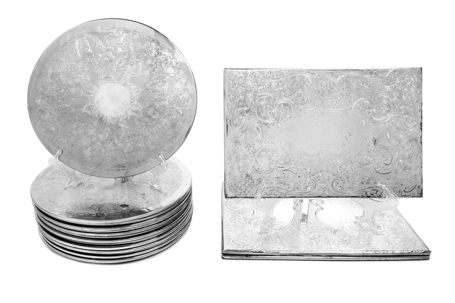 Eighteen Silver-plate Engraved Placemats Diameter 11 3/8 inches. — 20TH CENTURY
