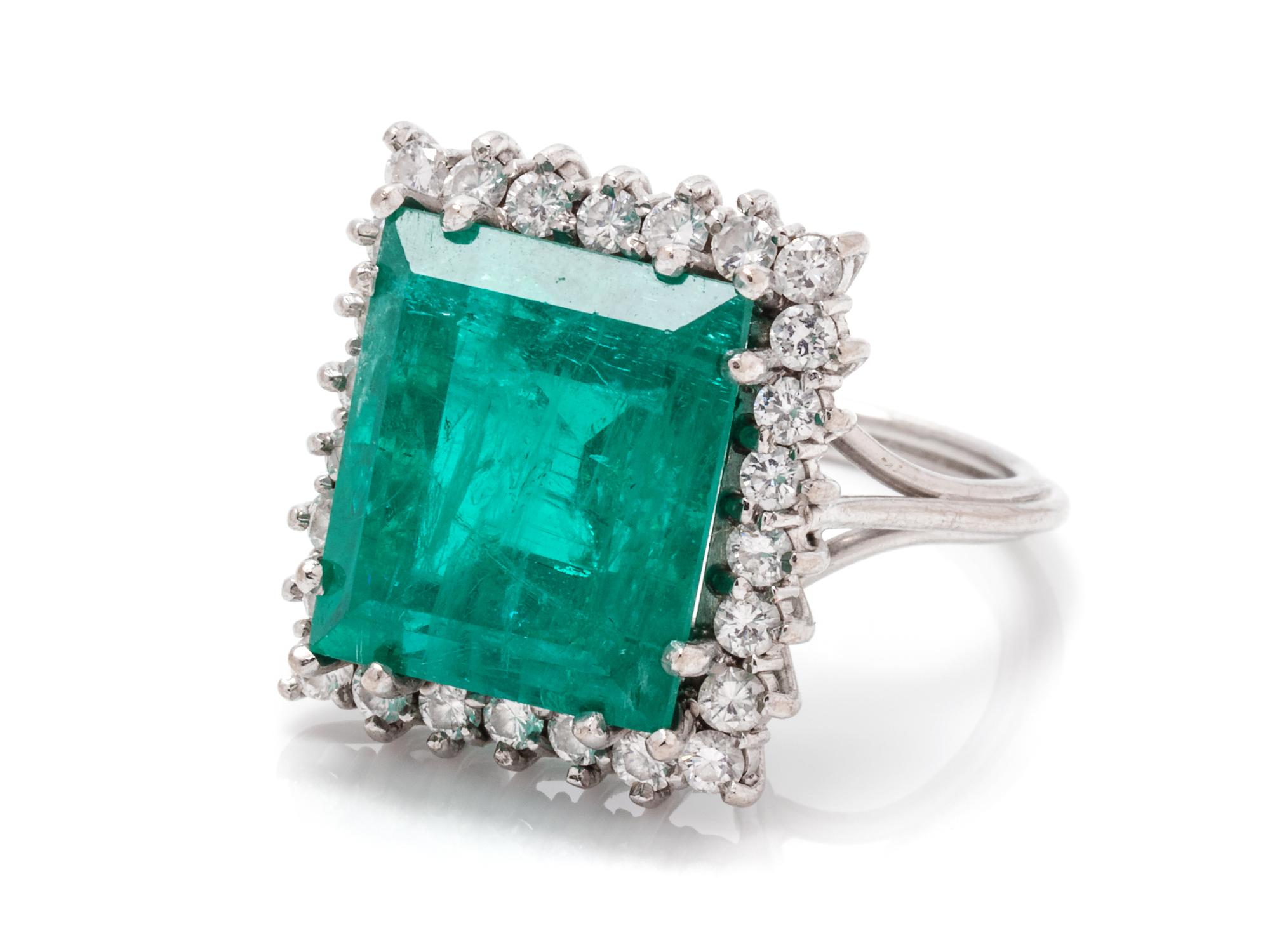 A White Gold, Emerald and Diamond Ring,