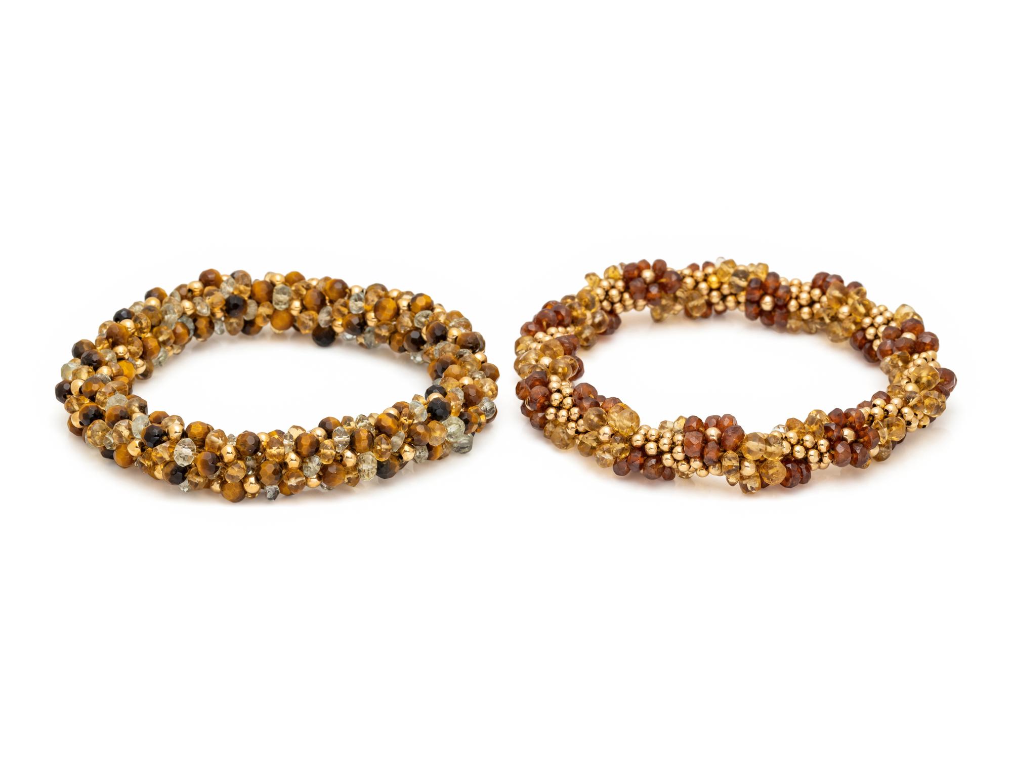 COLLECTION OF YELLOW GOLD AND GEMSTONE BEADED BRACELETS