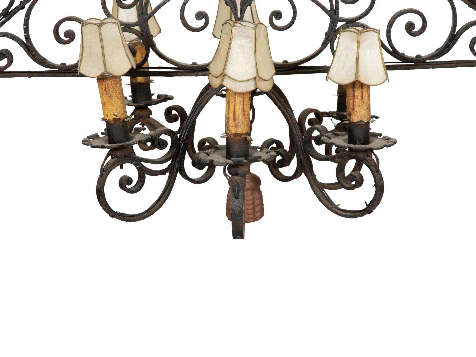 A Mizner Wrought Iron Twelve-Light Billiard Chandelier