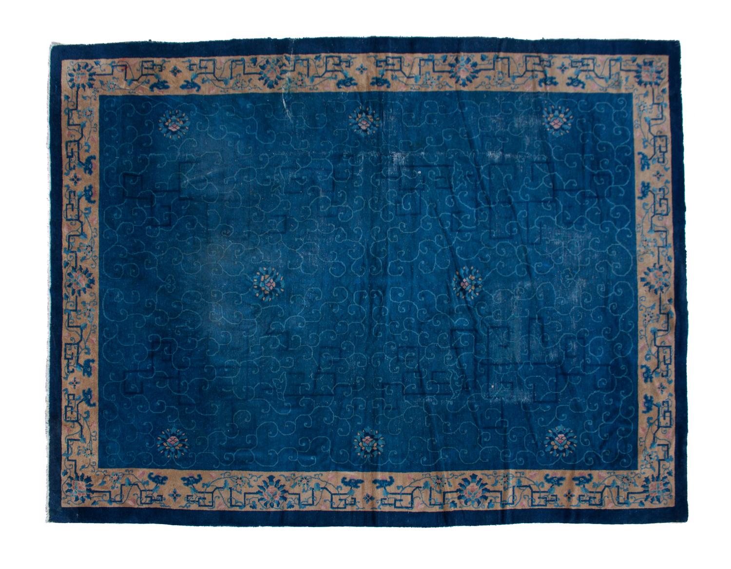 A Chinese Wool Rug 9 feet 1 inch x 11 feet 6 inches.