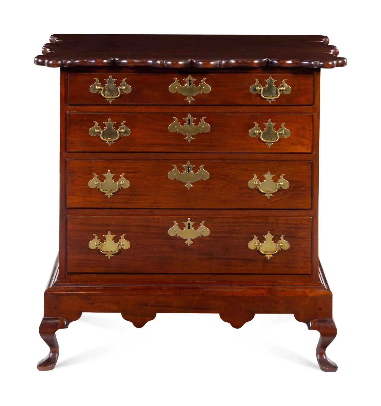 A Chippendale Style Cherry Chest of Drawers