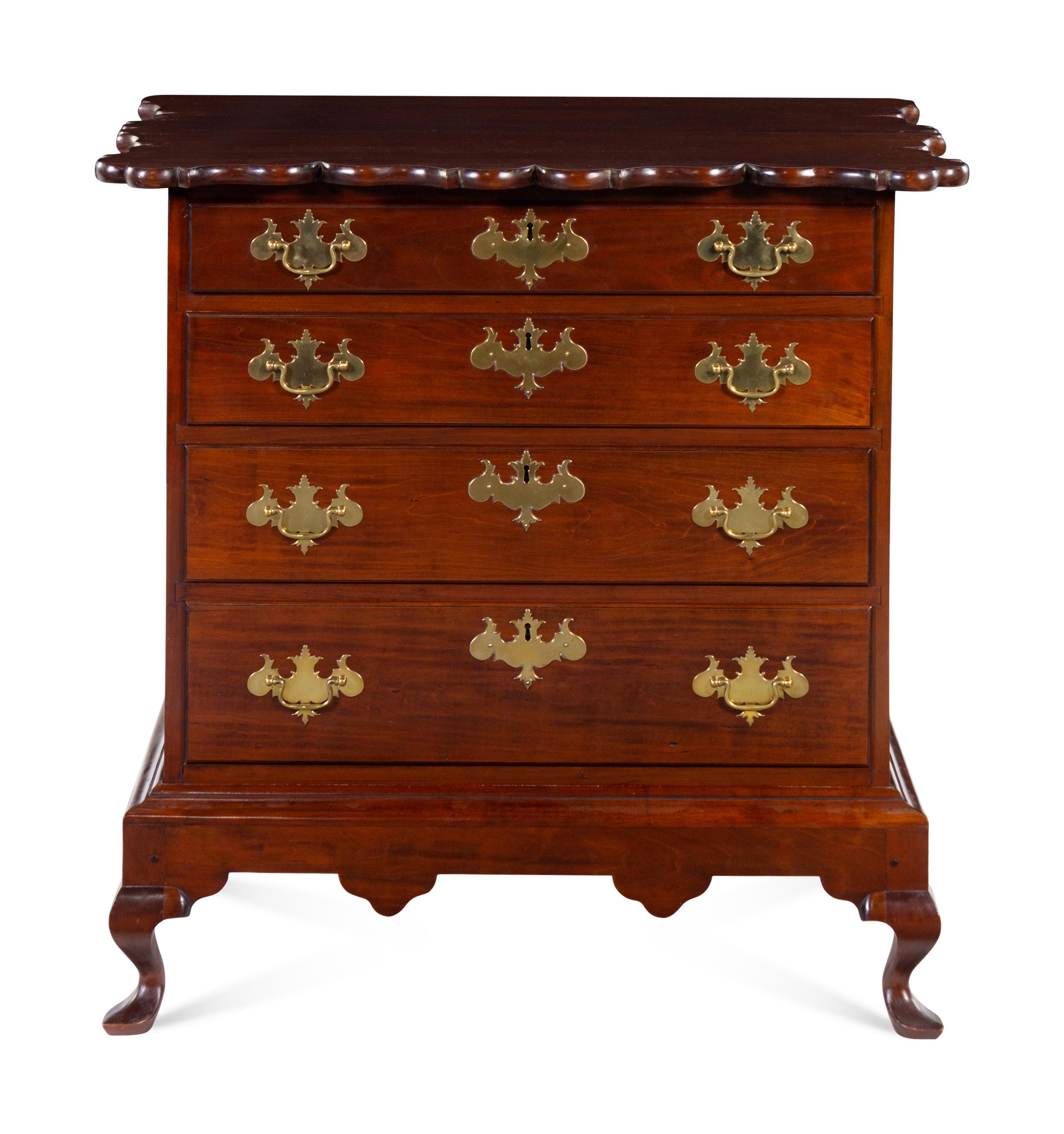 A Chippendale Style Cherry Chest of Drawers