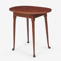 A Queen Anne carved tiger maple tavern table New England, 18th century