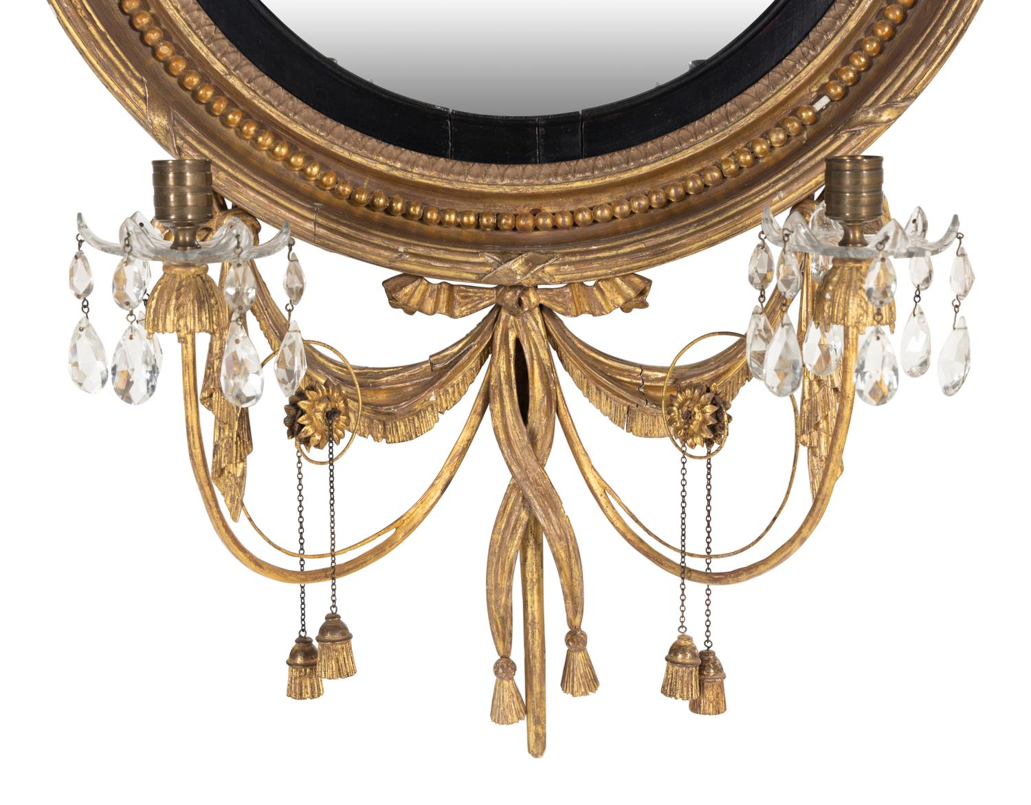 A George III Giltwood and Parcel-Ebonized Girandole Mirror