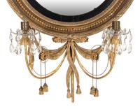 A George III Giltwood and Parcel-Ebonized Girandole Mirror