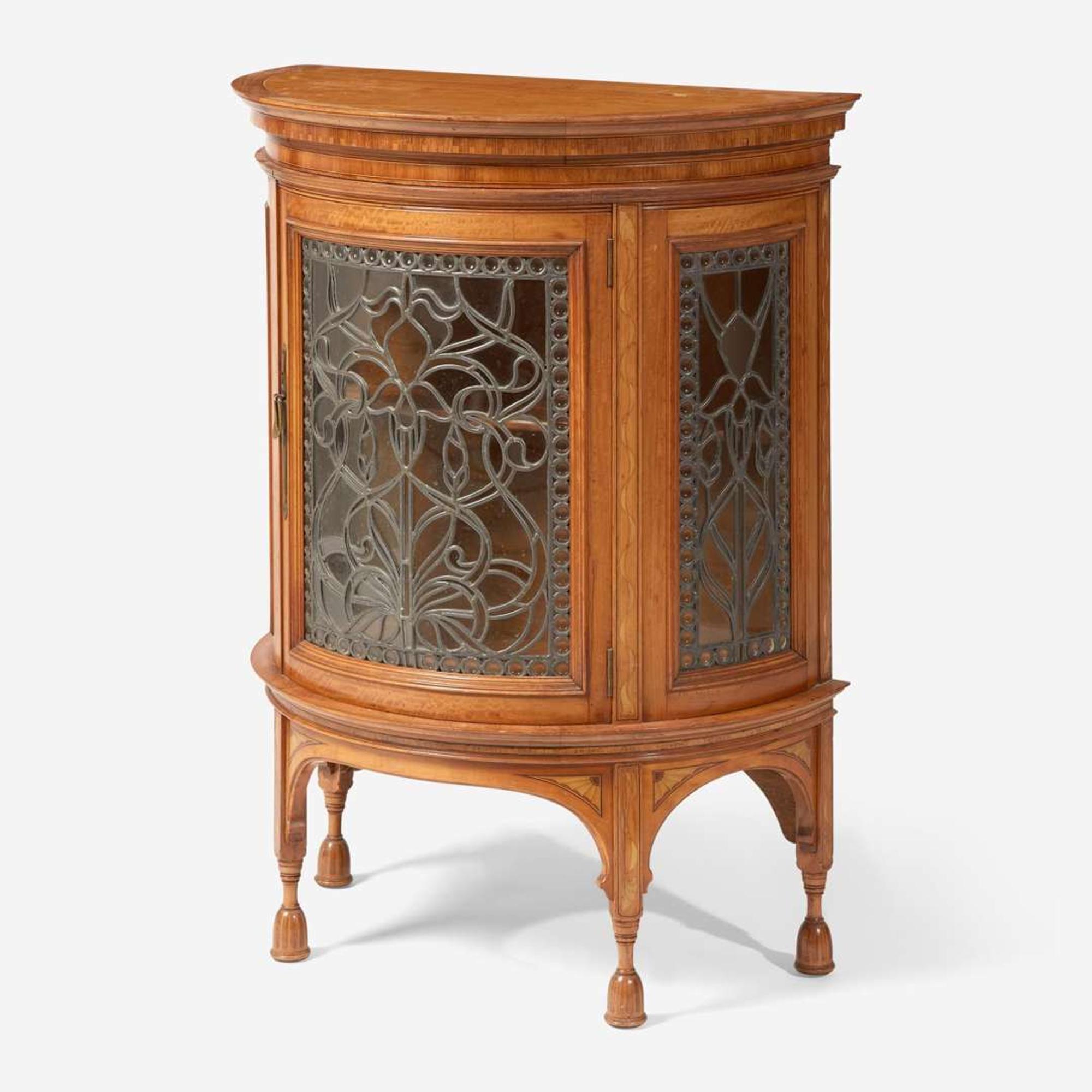 An English Aesthetic Movement inlaid satinwood and harewood demilune cabinet circa 1895