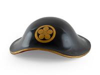 A Japanese Black and Gold Lacquer Helmet — 20TH CENTURY