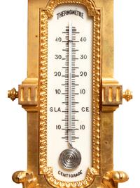 A Louis XVI Style Gilt Bronze Barometer and Thermometer