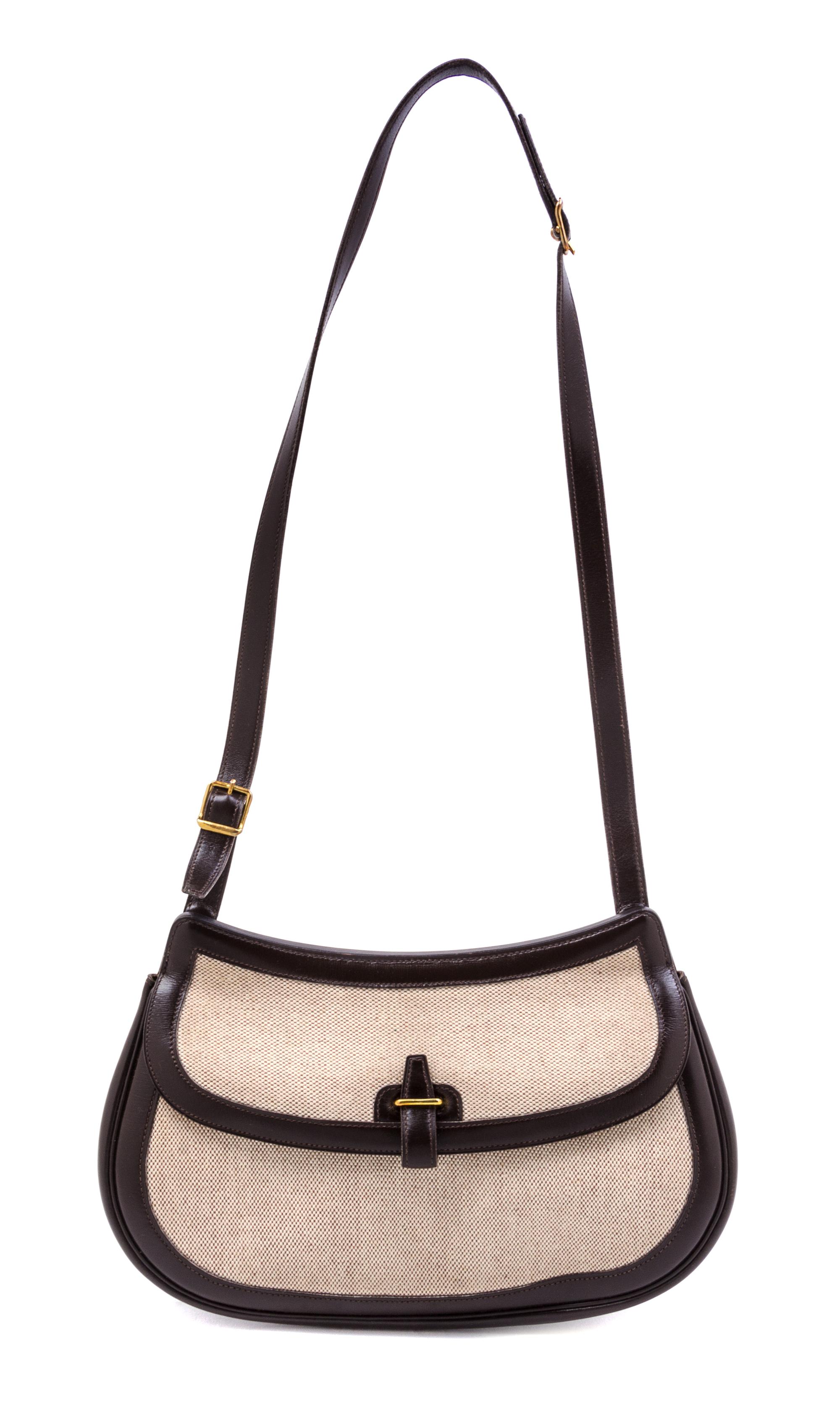 An Hermes Toile and Dark Brown Leather Handbag, 11.5" x 7.5" x 2.5".