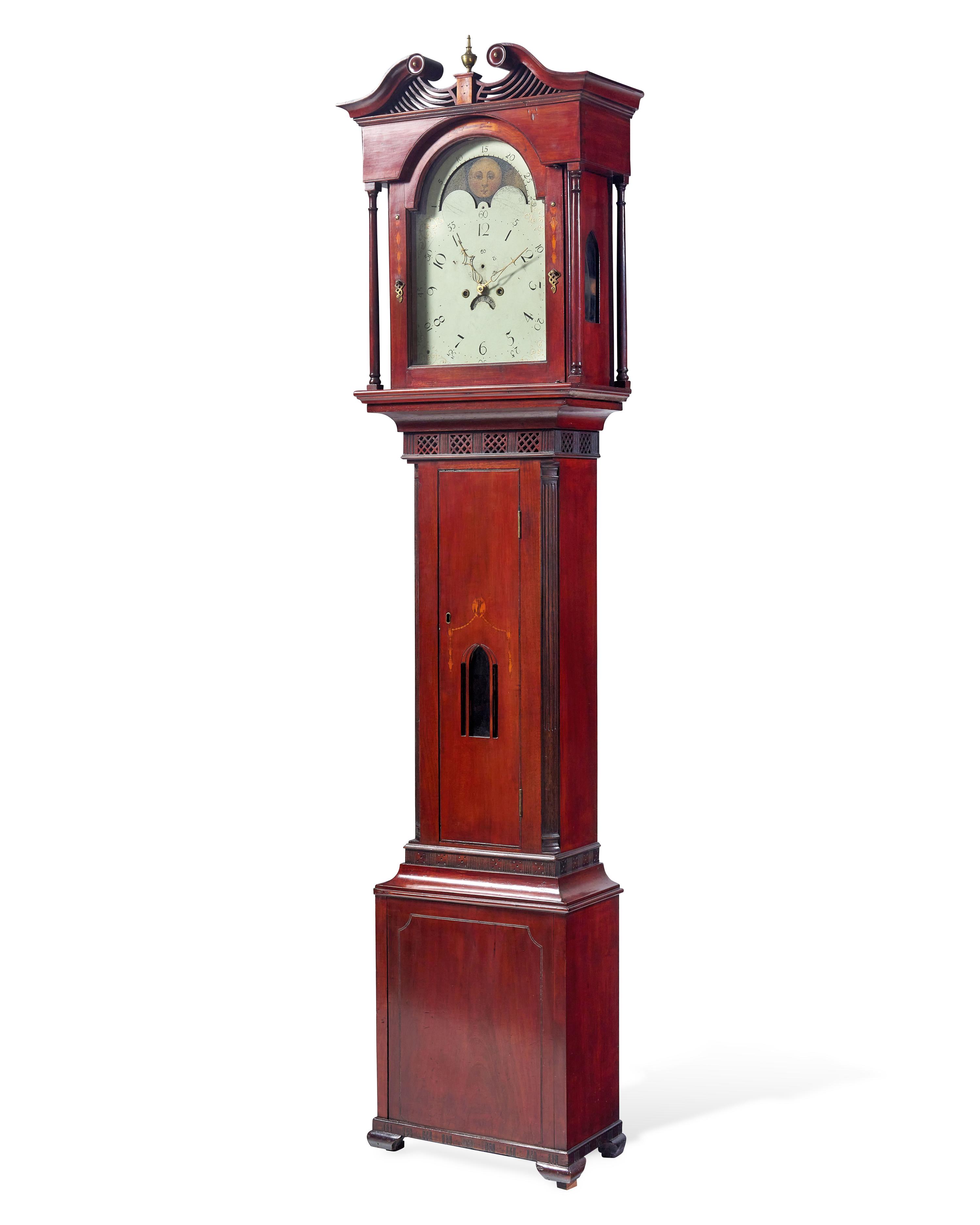 A Federal Carved And Inlaid Walnut and Cherrywood Tall Case Clock