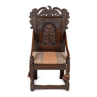 A Charles II Carved Oak Joined Armchair