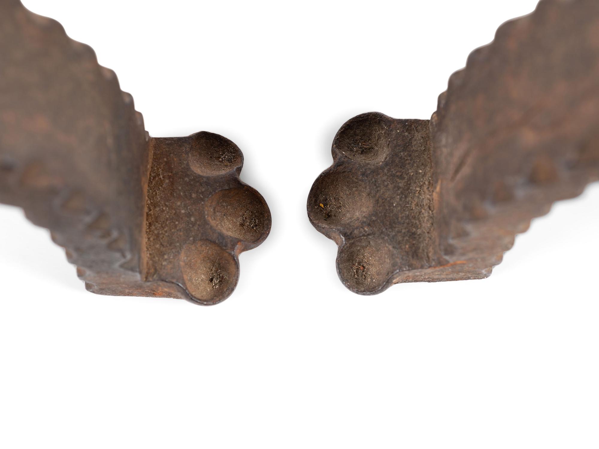A Pair of Cast Iron Caribou Andirons