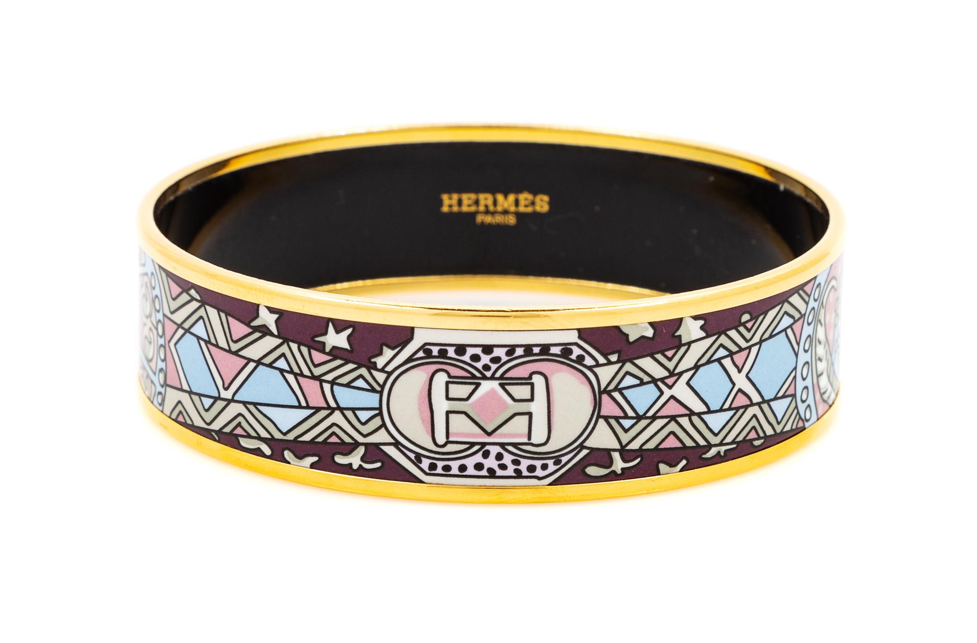 An Hermès Mauve Enamel 70mm Bangle, 2.75" diameter, .75" W.