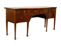 A George III Carved Mahogany Serpentine-Front Sideboard — 19TH CENTURY