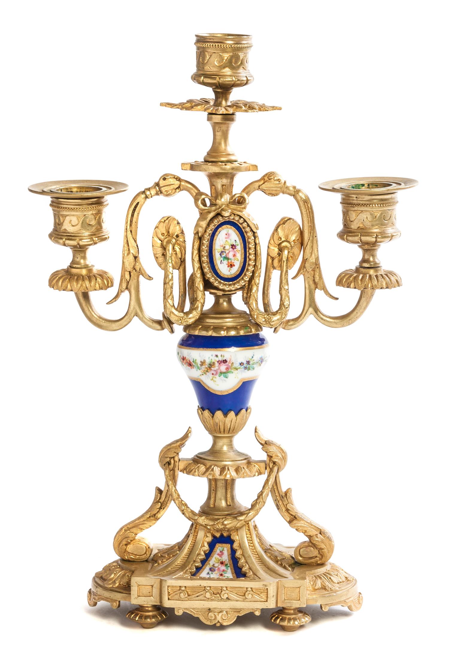 A Louis XVI Style Gilt Bronze and Sevres Style Porcelain Mounted Two-Light Candelabrum, Height 11 1/2 inches.