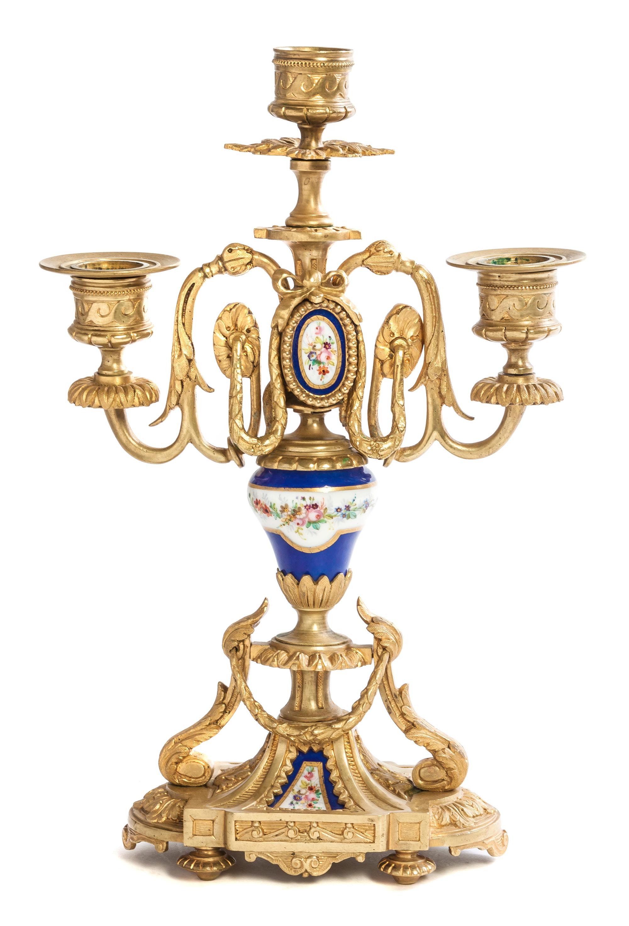 A Louis XVI Style Gilt Bronze and Sevres Style Porcelain Mounted Two-Light Candelabrum, Height 11 1/2 inches.