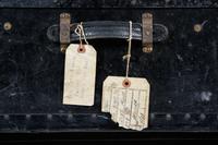 A Black Metal Steamer Trunk Height 12 1/2 inches x width 36 inches x depth 21 7/8 inches.